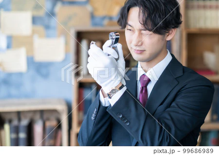 査定員 田中